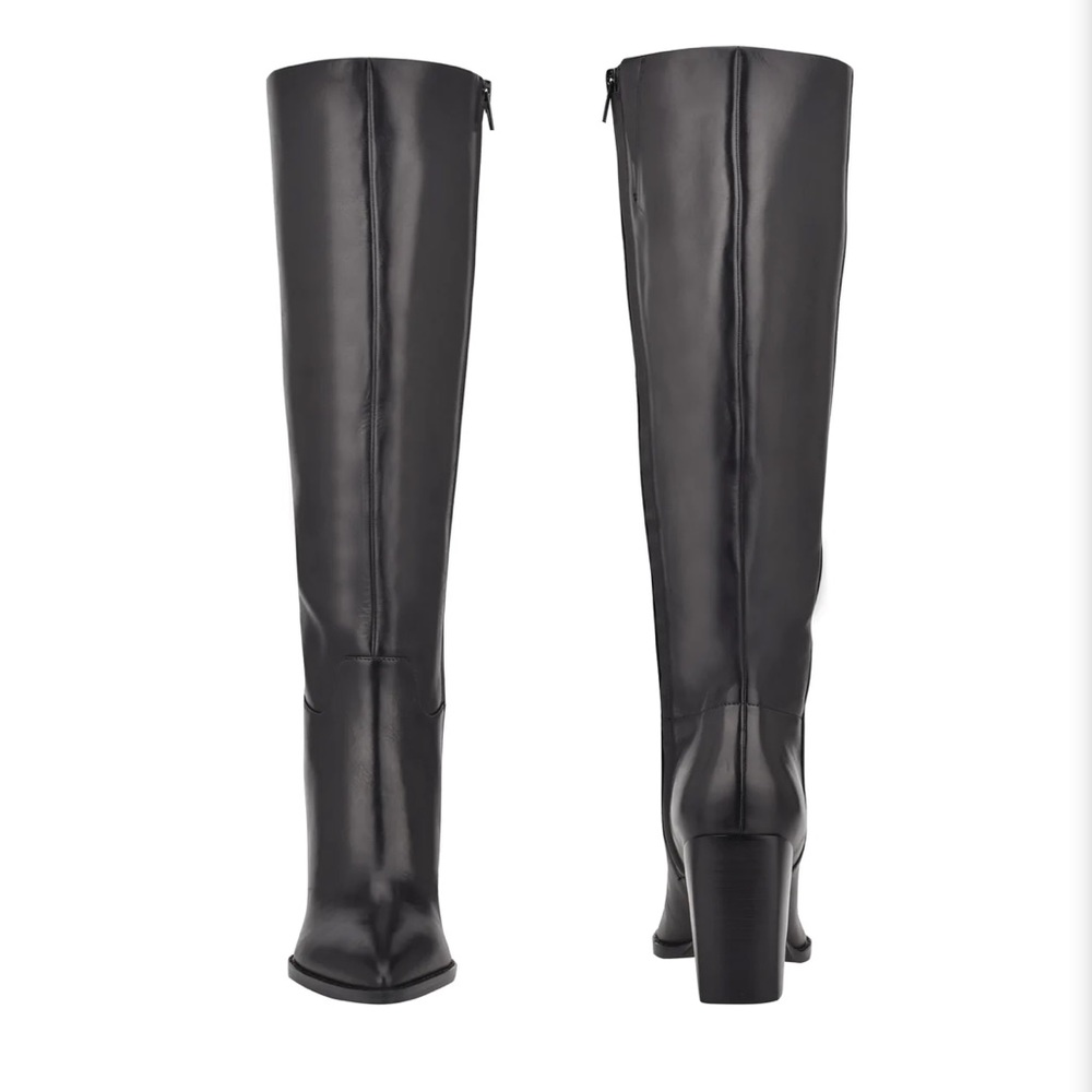 Brand new, never won. The Brixe Heeled Boots.